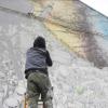 Знаменитый уличный художник Blu уничтожил все свои граффити в Болонье